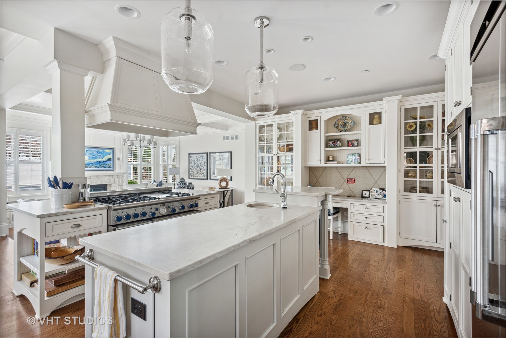 Undisclosed Address Glen Ellyn, IL 60137 - Photo 16 of 55 a kitchen with stainless steel appliances a stove a sink and a refrigerator