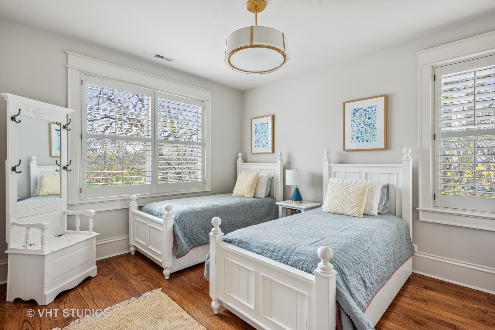 Undisclosed Address Glen Ellyn, IL 60137 - Photo 33 of 55 a spacious bedroom with two beds and a large window