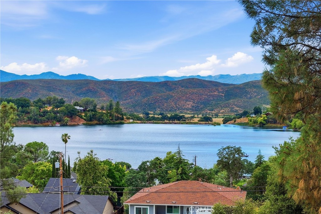18685 Oak Grove Road Hidden Valley Lake, CA 95467 - Photo 45 of 52 an aerial view of lake with residential house and mountain view