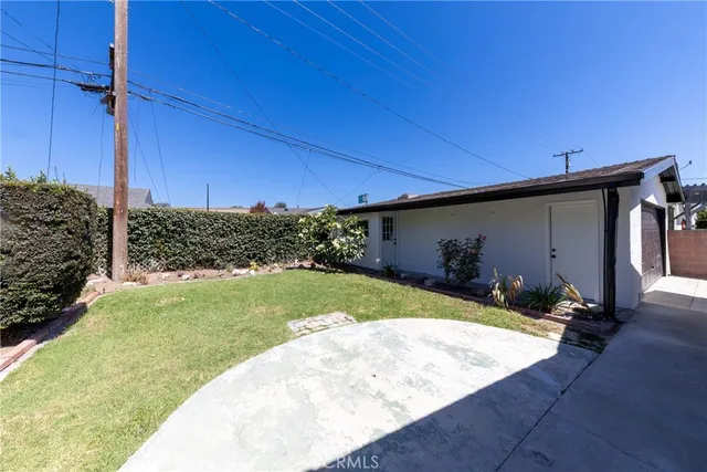 a house view with a garden space