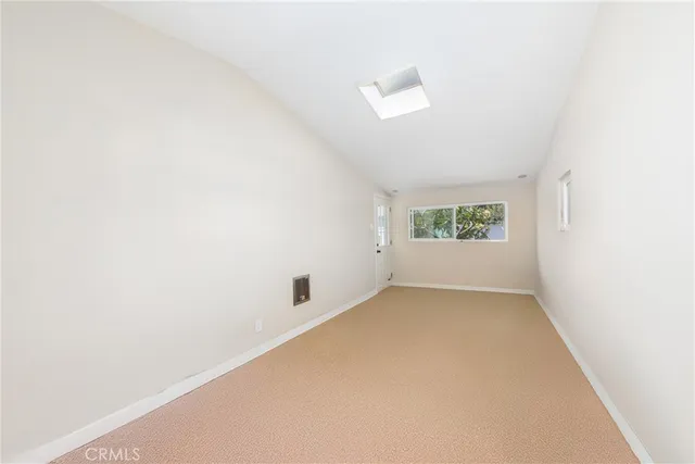 an aerial view of a houses with outdoor space