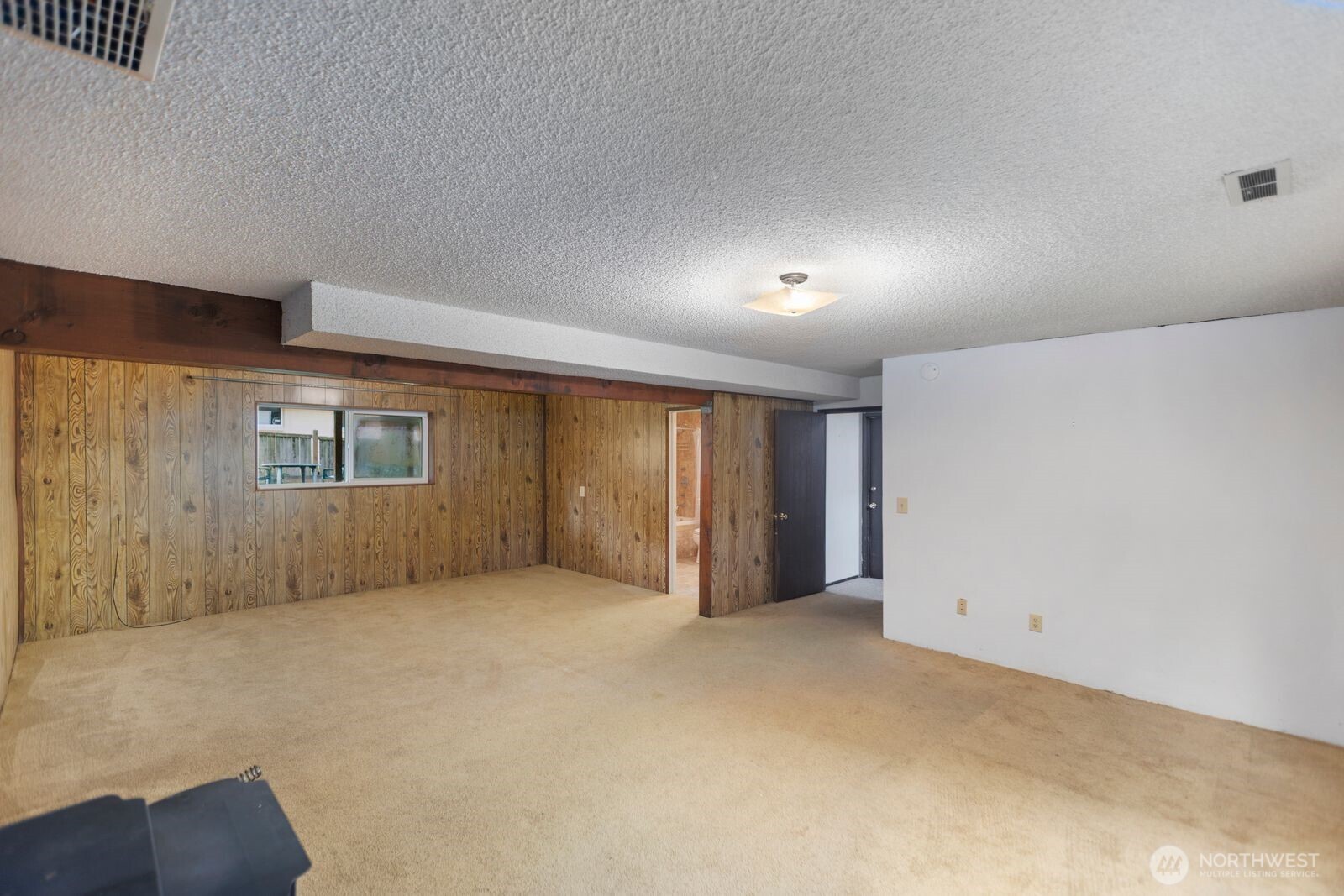 21627 9th Place West Bothell, WA 98021 - Photo 28 of 40 an empty room with windows