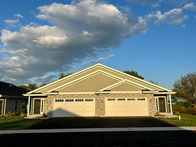 a view of a large house with lots of trees