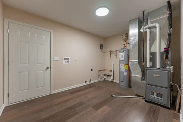 a view of a livingroom with wooden floor