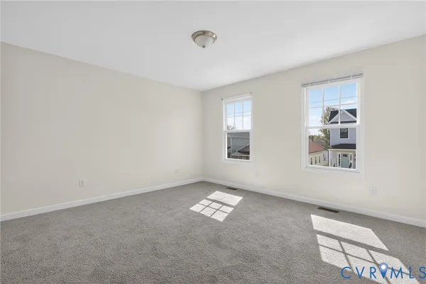 an empty room with windows