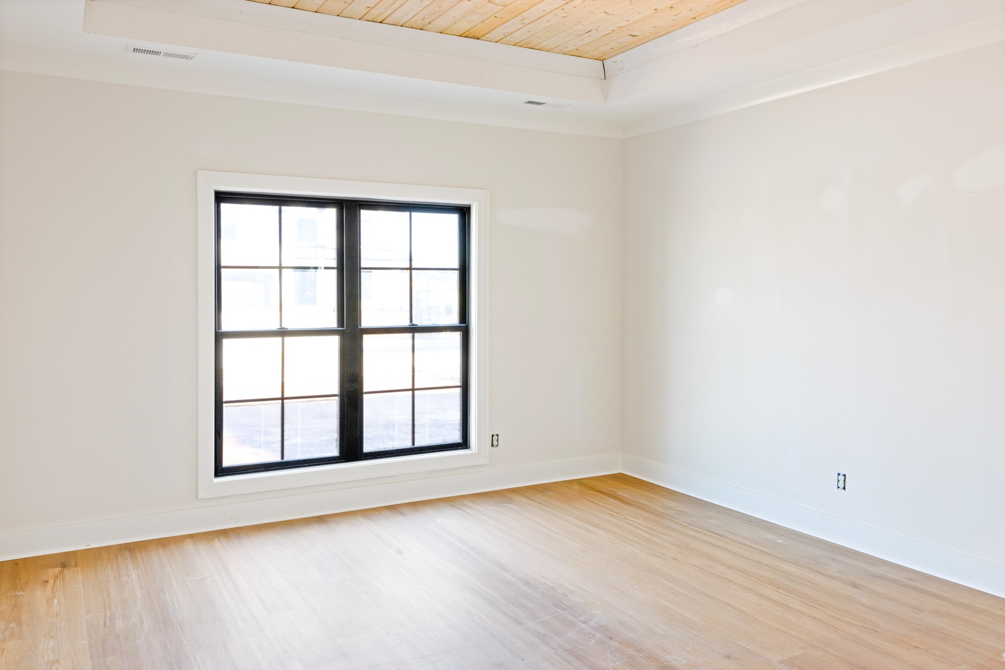 5540 Sinclair Street Murfreesboro, TN 37127 - Photo 11 of 16 an empty room with wooden floor and windows