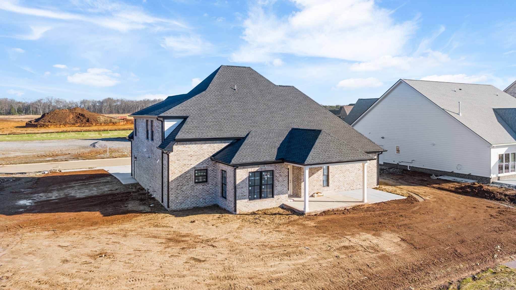 5540 Sinclair Street Murfreesboro, TN 37127 - Photo 6 of 16 a view of a house with a snow in the yard