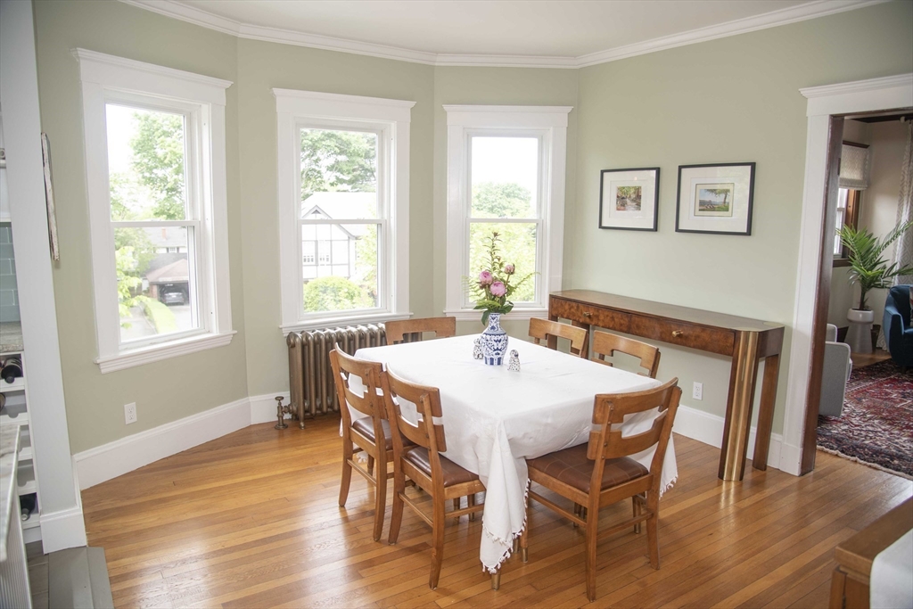3 Chester Road, Unit 3 Belmont, MA 02478 - Photo 10 of 40 a view of a dining room with furniture window and wooden floor