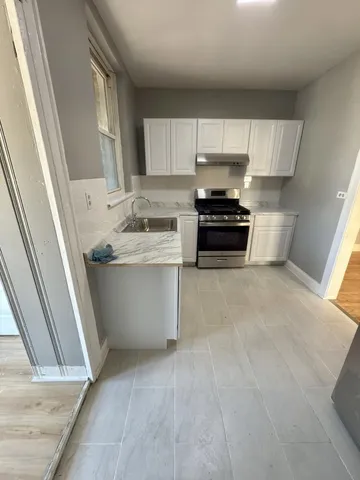 $1,395,000 | 6215 North Washtenaw Avenue, Chicago, IL 60659