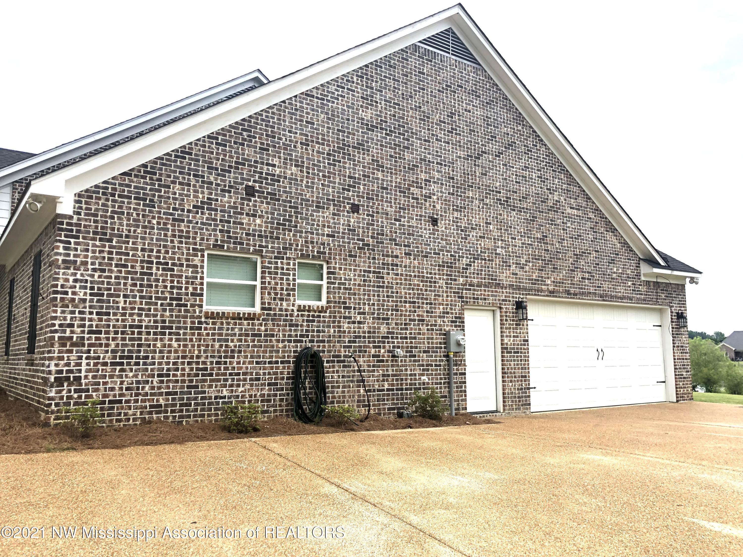 103 Ridgewood Cove Coldwater, MS 38618 - Photo 8 of 56 Man door