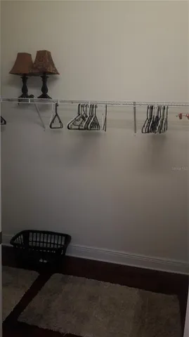 a view of a room with racks on the wall