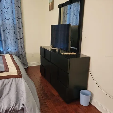 a view of workspace with wooden floor washer and dryer