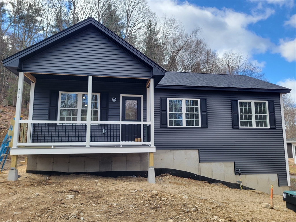 a house view with a garden space