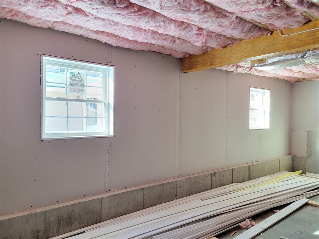 741 Chestnut Street Athol, MA 01331 - Photo 12 of 13 a bedroom with a bed and a window