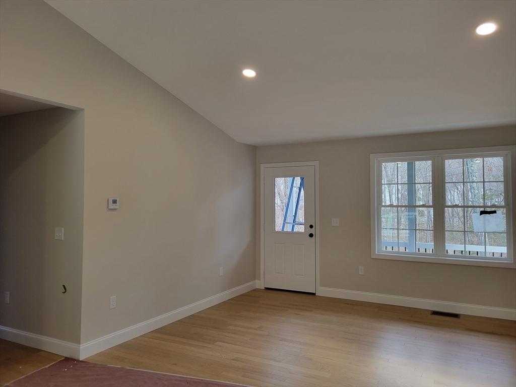 741 Chestnut Street Athol, MA 01331 - Photo 5 of 13 an empty room with windows