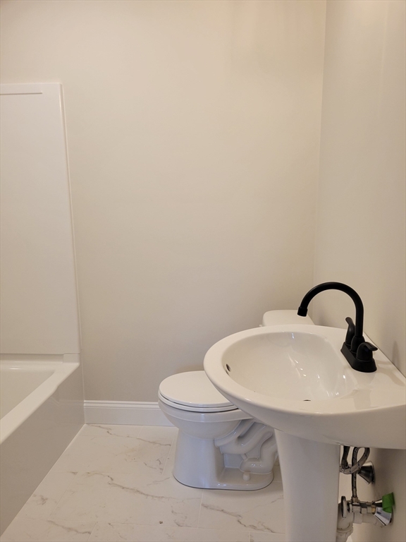 741 Chestnut Street Athol, MA 01331 - Photo 9 of 13 a bathroom with a sink and a toilet