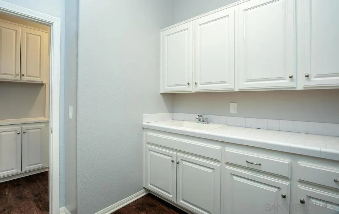 14525 Millards Ranch Lane Poway, CA 92064 - Photo 15 of 29 a view of cabinets and wooden floor