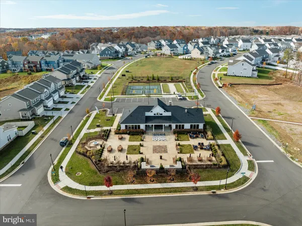 a view of a swimming pool with lounge chairs