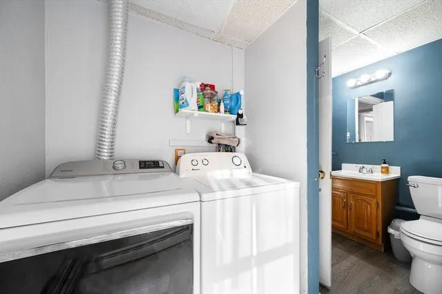a utility room with dryer and washer