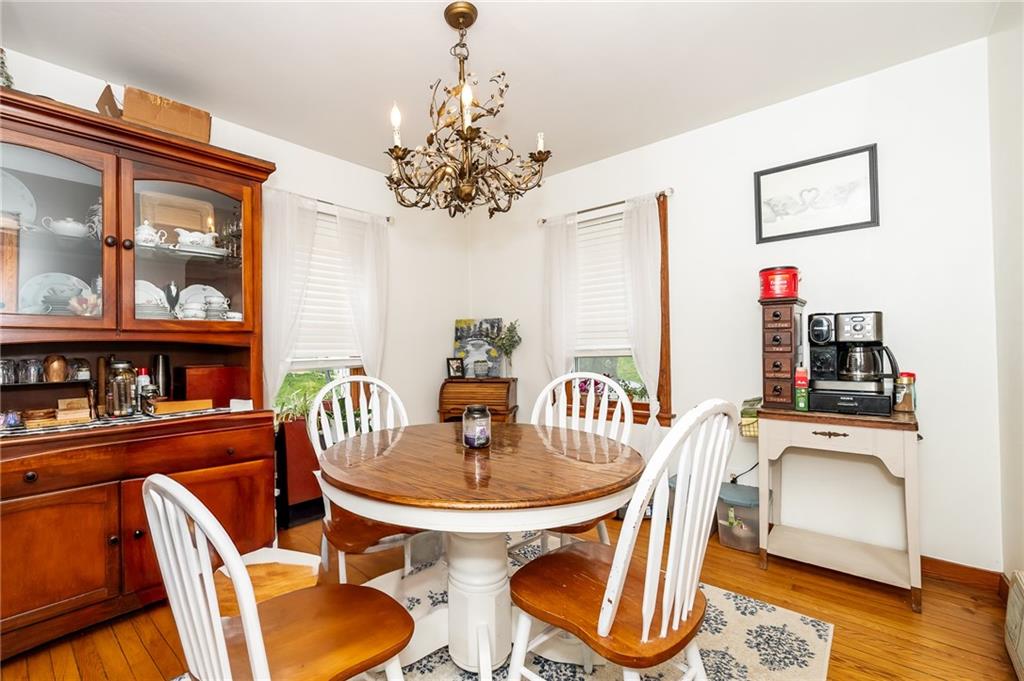 463 Butler Road Kittanning, PA 16201 - Photo 11 of 30 a view of a dining room with furniture wooden floor and chandelier
