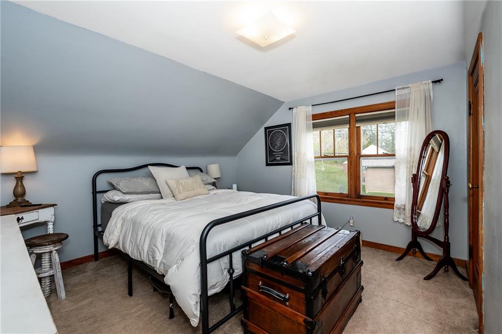 463 Butler Road Kittanning, PA 16201 - Photo 13 of 30 a bedroom with a bed chair and a window