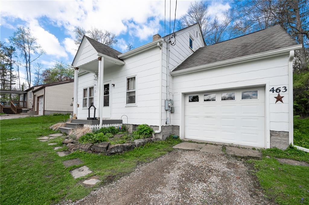 463 Butler Road Kittanning, PA 16201 - Photo 23 of 30 a view of a white house with a small yard plants and a large tree