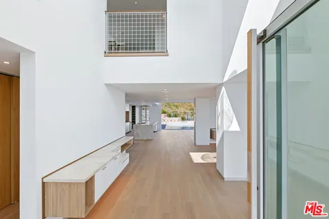 a view of an entryway with a room