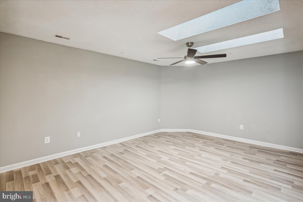 12901 Churchill Ridge Circle, Unit 14 Germantown, MD 20874 - Photo 35 of 46 wooden floor in a room