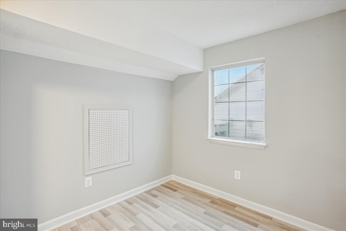 12901 Churchill Ridge Circle, Unit 14 Germantown, MD 20874 - Photo 41 of 46 an empty room with windows