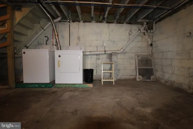 a view of a room with wooden walls