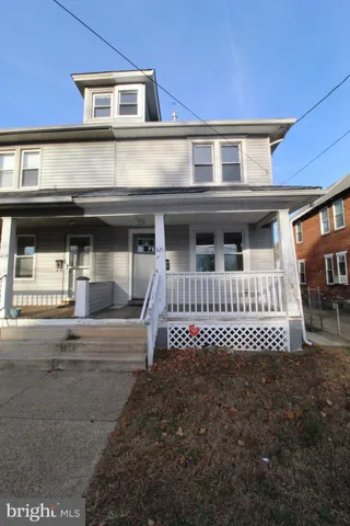 a view of a house with a large window
