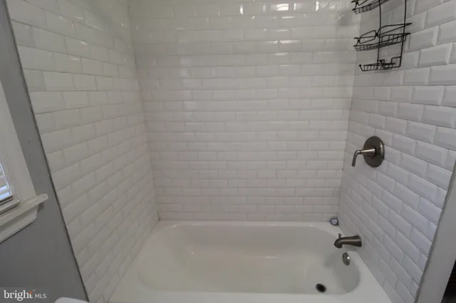 a close up of a bathtub