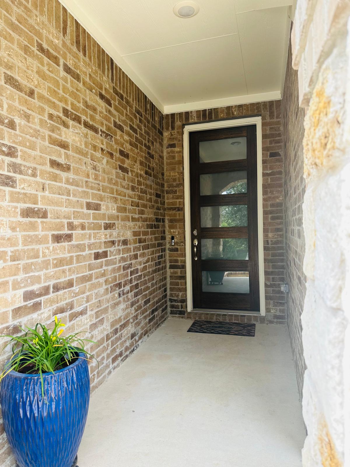 862 Leadtree Loop Buda, TX 78610 - Photo 4 of 40 a view of front door with outdoor space