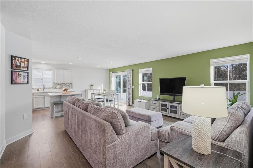 237 Smith Lane Beaver Falls, PA 15010 - Photo 11 of 25 a living room with furniture and a flat screen tv