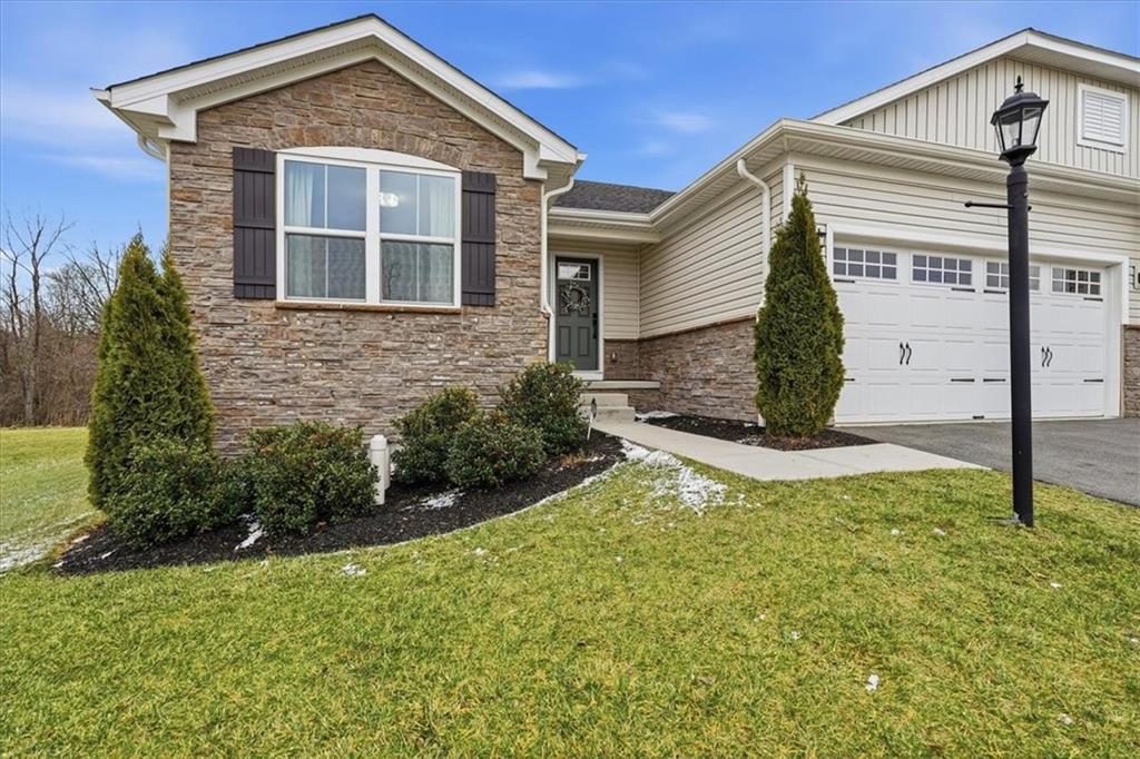 237 Smith Lane Beaver Falls, PA 15010 - Photo 2 of 25 a front view of a house with a yard