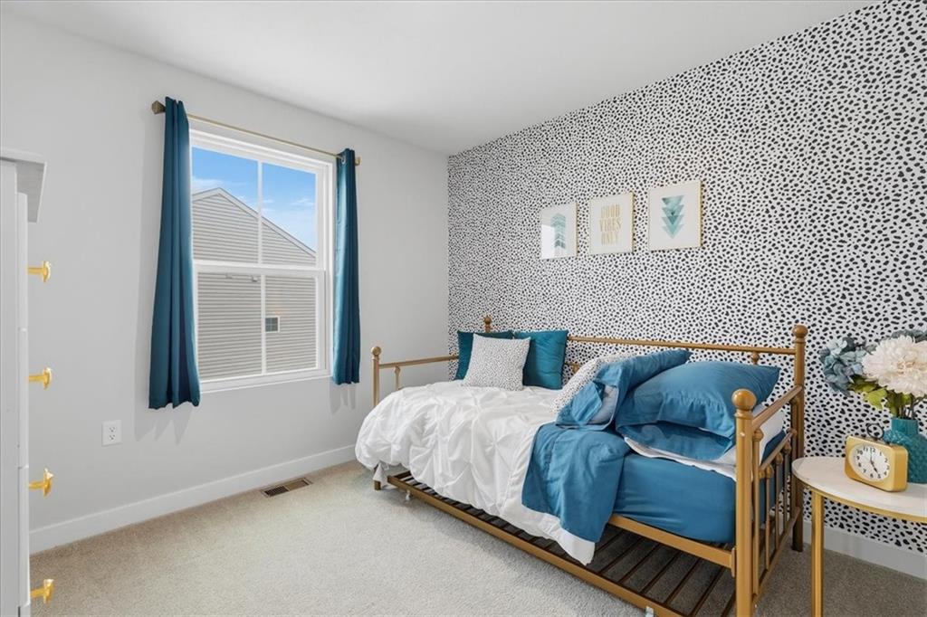 237 Smith Lane Beaver Falls, PA 15010 - Photo 22 of 25 a bedroom with a bed and a window