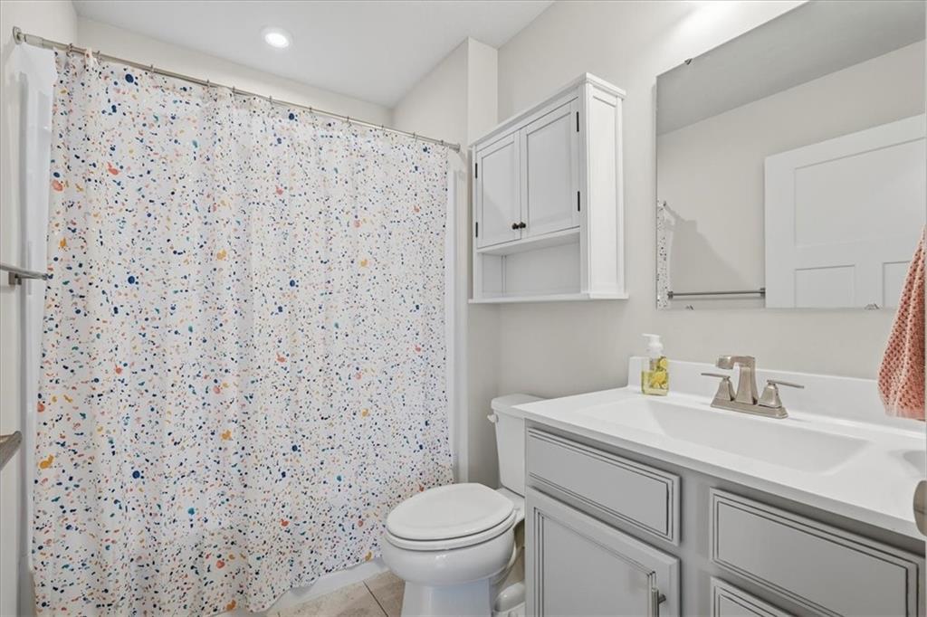 237 Smith Lane Beaver Falls, PA 15010 - Photo 23 of 25 a bathroom with a sink toilet and a mirror