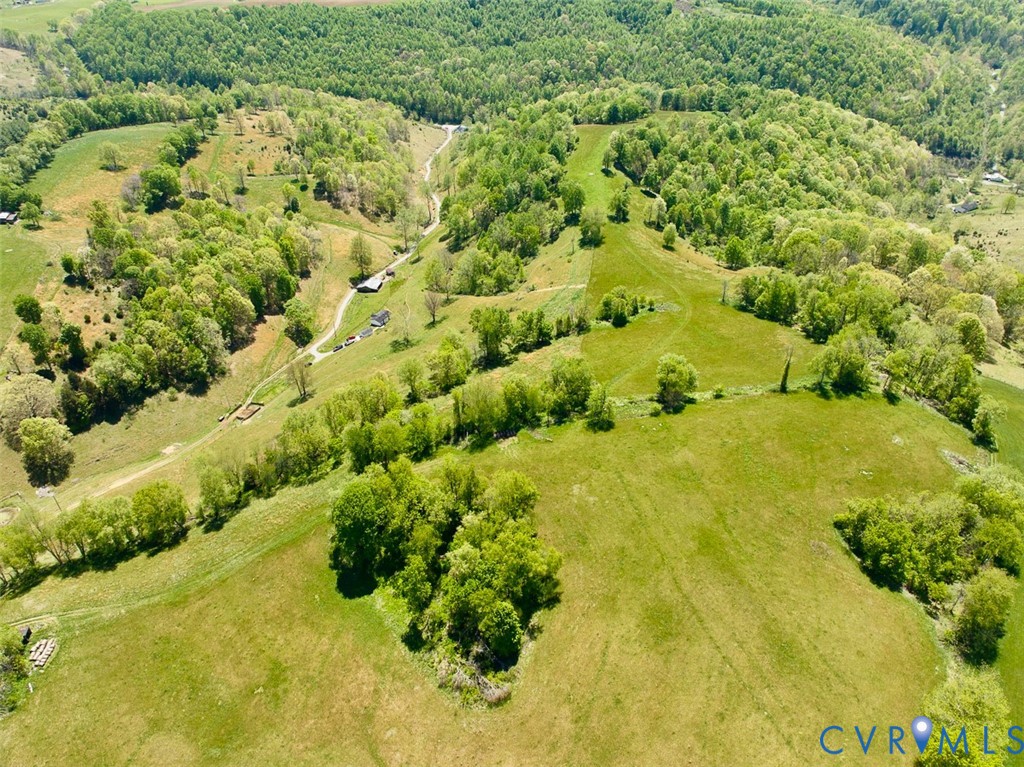 453 Long Hollow Road Cleveland, VA 24225 - Photo 28 of 50 a view of a garden with a building
