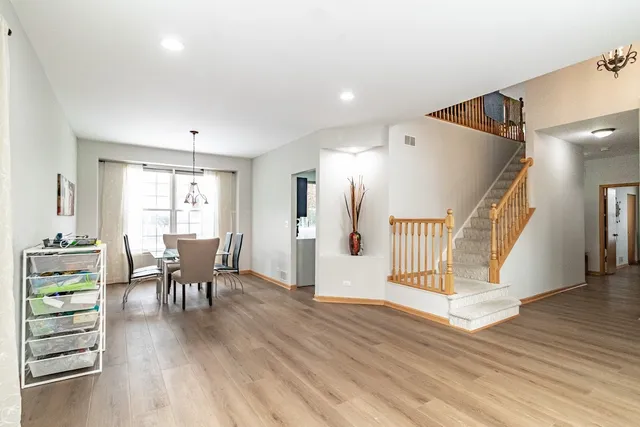 a view of a livingroom with furniture and wooden floor