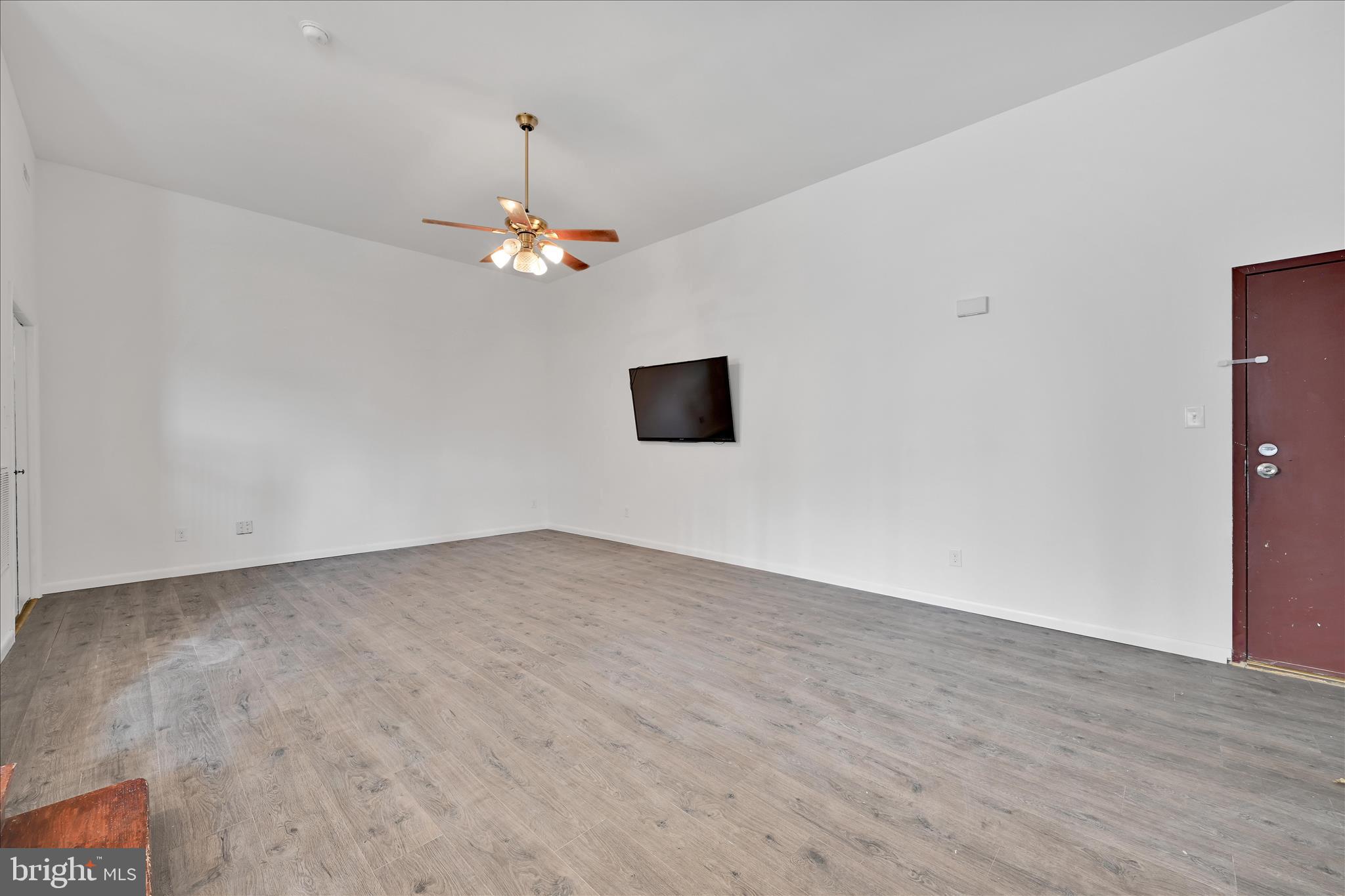 709 Hill Road, Unit 7 Wernersville, PA 19565 - Photo 3 of 24 a view of empty room with wooden floor