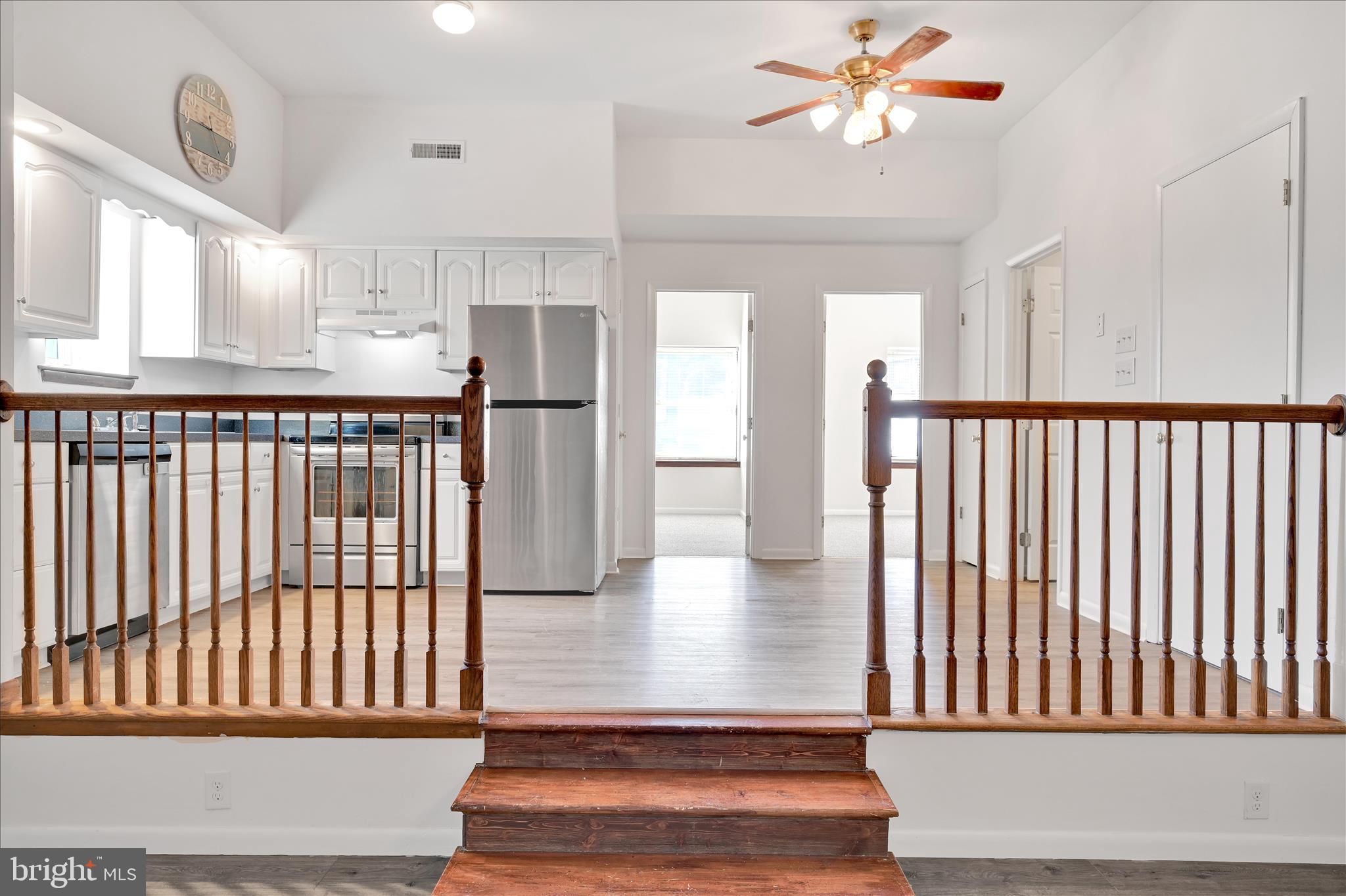 709 Hill Road, Unit 7 Wernersville, PA 19565 - Photo 5 of 24 a view of staircase with white walls and a window