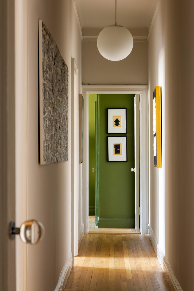 993 Park Avenue, Unit 11A Manhattan, NY 10028 - Photo 12 of 24 a view of a bathroom with a sink and a mirror
