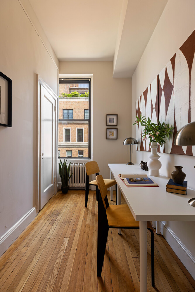 993 Park Avenue, Unit 11A Manhattan, NY 10028 - Photo 22 of 24 a view of a dining room with furniture window and wooden floor