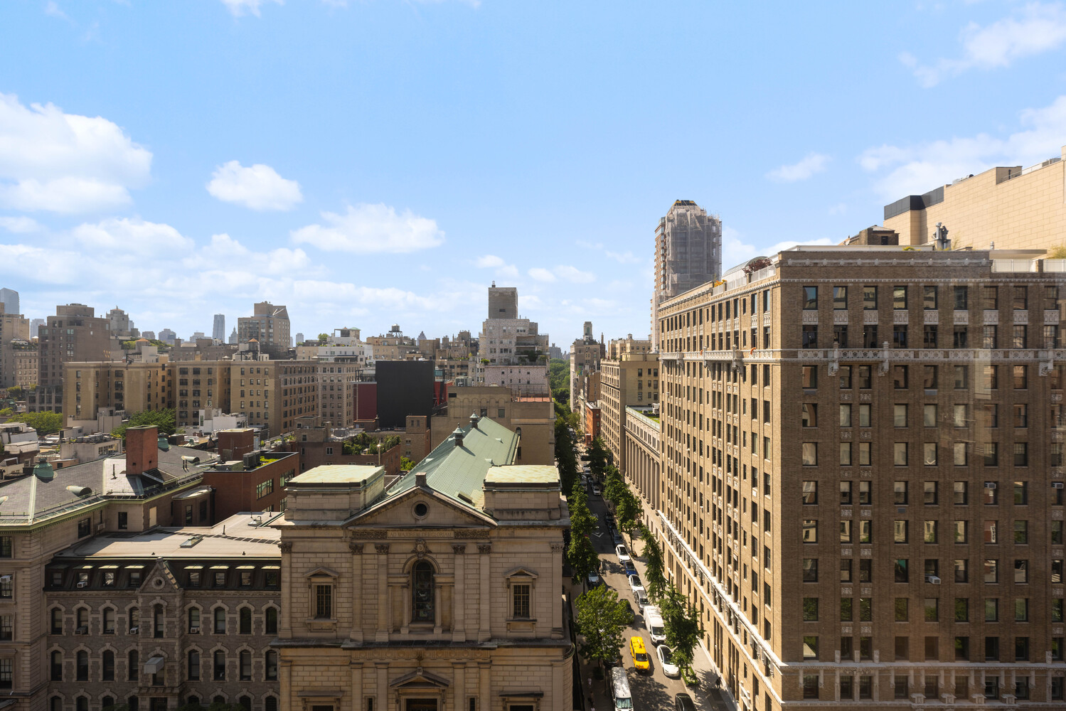993 Park Avenue, Unit 11A Manhattan, NY 10028 - Photo 5 of 24 a view of a city with tall buildings