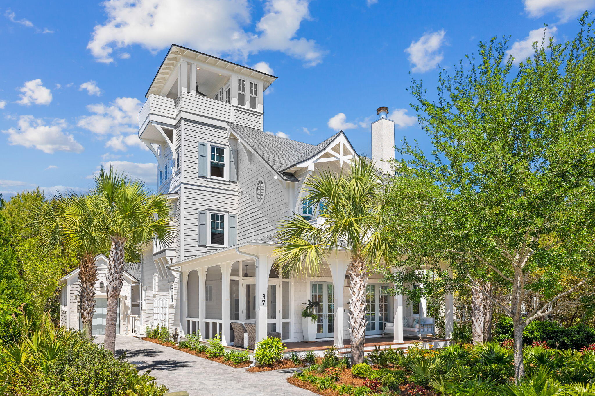 37 Creek Bridge Way Inlet Beach, FL 32461 - Photo 8 of 29 a front view of a multi story residential apartment building with yard and parking space