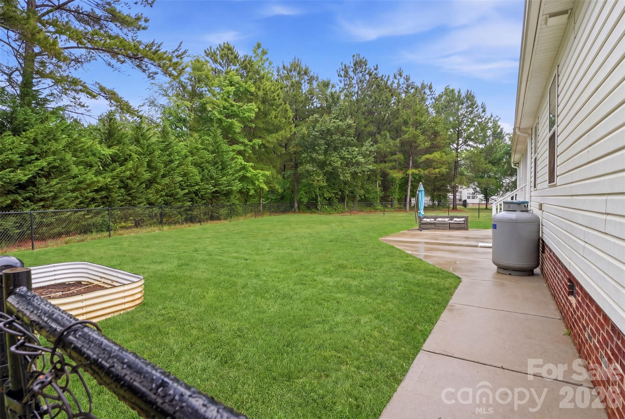 810 Tirzah Road York, SC 29745 - Photo 23 of 29 a view of a backyard with sitting area