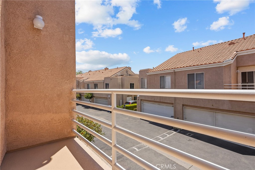25511 Schubert Circle, Unit 142B Stevenson Ranch, CA 91381 - Photo 29 of 47 Balcony off Bedroom #3