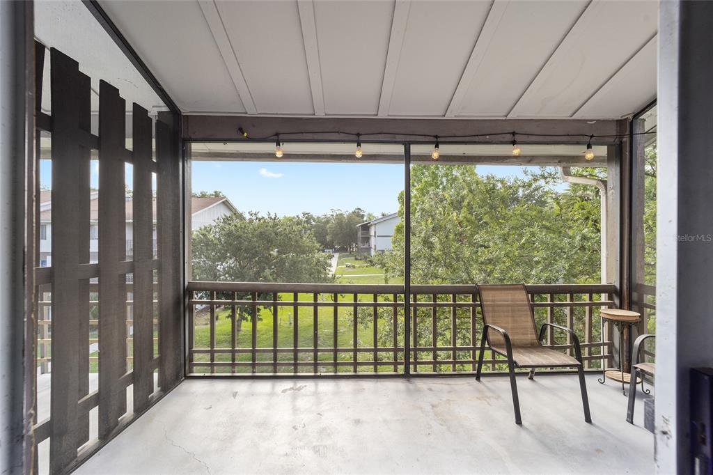 6519 West Newberry Road, Unit 1210 Gainesville, FL 32605 - Photo 14 of 16 a view of outdoor space with seating area