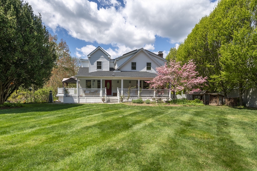 229 Parkerville Road Southborough, MA 01772 - Photo 3 of 38 a front view of a house with a garden