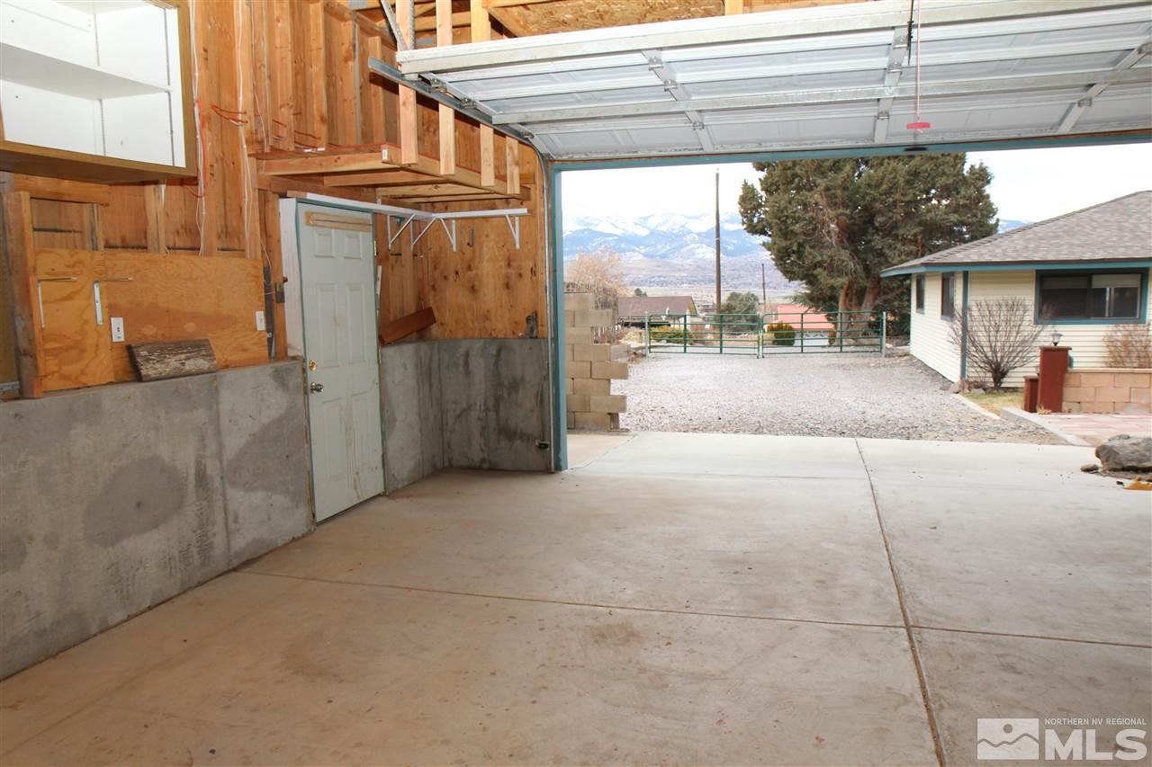 14170 Rim Rock Drive Reno, NV 89521 - Photo 19 of 25 a view of a building with a outdoor space